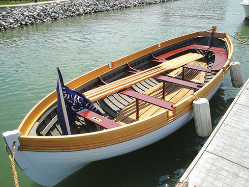 Custom wood-epoxy reproduction of Commodore Perry longboat